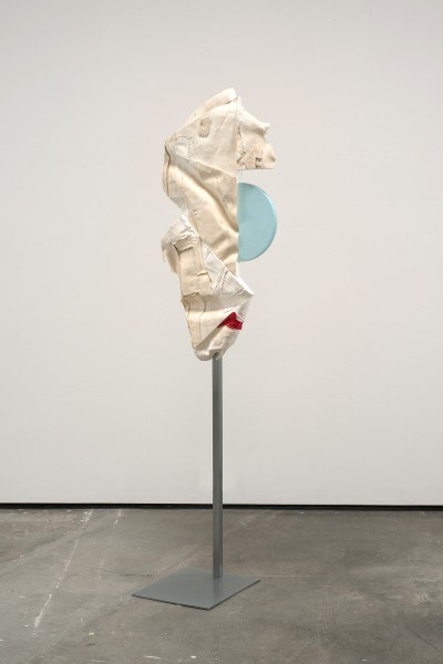 Erik Frydenborg, Serratus Recto-Verso, 2009. Pigmented polyurethane, brushed chrome hanging stand, hardware, latex rubber, graphite, cable tie.
66 x 18 x 14 inches.