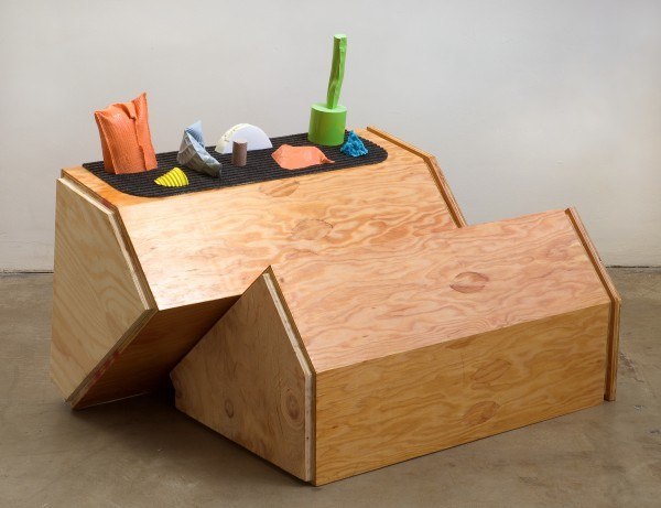 Erik Frydenborg, Untitled (Refrain), 2009. Pigmented polyurethane (plastic and foam), rubber welcome mat, replicated plywood pedestals.28 x 40 x 27 inches.